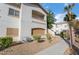 A two story home with a front entrance, a balcony and a walkway in front at 5655 E Sahara Ave # 1037, Las Vegas, NV 89142