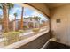 View of the community clubhouse and surrounding landscaping at 5655 E Sahara Ave # 1037, Las Vegas, NV 89142