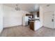 Bright living room area adjacent to the kitchen, featuring tile floors and an open layout at 5655 E Sahara Ave # 1037, Las Vegas, NV 89142