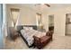 Relaxing main bedroom with decorative accents and ample natural light at 6009 La Coste St, North Las Vegas, NV 89081