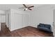 Bedroom with hard floors and a ceiling fan at 6017 Natures Dr, Las Vegas, NV 89122