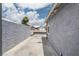 View of the side of the home and driveway at 6017 Natures Dr, Las Vegas, NV 89122