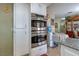Gourmet kitchen with stainless steel double ovens and ample storage space at 604 N Torrey Pines Dr, Las Vegas, NV 89107