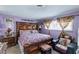 Main bedroom with a plush king-sized bed and stylish decor at 604 N Torrey Pines Dr, Las Vegas, NV 89107