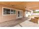 Covered patio with French doors, offers a seamless transition between indoor and outdoor living spaces at 604 N Torrey Pines Dr, Las Vegas, NV 89107