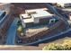 Aerial view of house featuring modern exterior and surrounding landscaping at 609 Sleeping Dragon Dr, Henderson, NV 89012