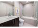 Modern bathroom features a soaking tub, frameless glass, and designer vanity at 609 Sleeping Dragon Dr, Henderson, NV 89012