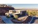 Contemporary two-story home with a desert landscape, offering scenic views at 609 Sleeping Dragon Dr, Henderson, NV 89012
