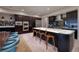 Gourmet kitchen with barstool seating at the island and sleek, built-in appliances at 609 Sleeping Dragon Dr, Henderson, NV 89012