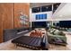 Spacious living room featuring a soaring ceiling, modern fireplace, and large windows with city views at 609 Sleeping Dragon Dr, Henderson, NV 89012