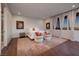 Bright main bedroom features hardwood floors, neutral paint, and ample natural light at 609 Sleeping Dragon Dr, Henderson, NV 89012