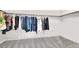 Walk-in closet with lots of hanging storage space and neutral carpet at 6618 Palm Branch St, North Las Vegas, NV 89086