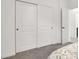 Bedroom closet featuring sliding doors with paint finish and a neutral carpeting at 6618 Palm Branch St, North Las Vegas, NV 89086