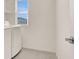 Well-lit laundry room featuring modern washer and dryer at 6618 Palm Branch St, North Las Vegas, NV 89086