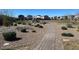 Neighborhood park featuring a playground, gazebo, walking path and drought resistant landscaping at 6618 Palm Branch St, North Las Vegas, NV 89086