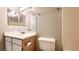 Bathroom featuring a shower and tub combo, a toilet, and a sink with mirror at 7885 W Flamingo Rd # 2003, Las Vegas, NV 89147