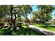 Landscaped community common area with pool access at 7885 W Flamingo Rd # 2003, Las Vegas, NV 89147