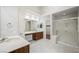 Modern bathroom featuring dual sinks, a walk-in shower, and updated fixtures at 8541 Highland View Ave, Las Vegas, NV 89145