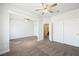Bedroom with ceiling fan and view to closet and bathroom at 8541 Highland View Ave, Las Vegas, NV 89145