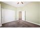 Bedroom with carpet, double door closet and doorway to another room at 8541 Highland View Ave, Las Vegas, NV 89145