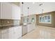 Open kitchen with granite countertops, stainless steel appliances, and a breakfast bar for casual dining at 8541 Highland View Ave, Las Vegas, NV 89145