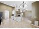 Spacious living area with granite countertop island, perfect for entertaining guests at 8541 Highland View Ave, Las Vegas, NV 89145