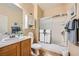 Cozy bathroom features a shower-tub combo, modern fixtures, and ample storage space at , Henderson, NV 89044