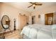 Serene bedroom featuring a ceiling fan, wood-look flooring, and ample natural light at , Henderson, NV 89044