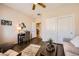 Cozy bedroom featuring a workspace, couch, and neutral decor at , Henderson, NV 89044