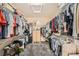 Spacious walk-in closet provides ample storage with hanging racks and shelving units at , Henderson, NV 89044