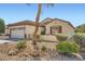 Exterior view of a single story home, with landscaped front yard at , Henderson, NV 89044