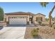 Charming single-story home featuring a two-car garage and desert landscaping for low maintenance appeal at , Henderson, NV 89044