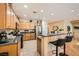 Well-lit kitchen boasts granite countertops and stainless steel appliances at , Henderson, NV 89044