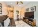Comfortable living room with modern decor, plush rug, and entertainment center at , Henderson, NV 89044