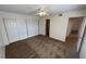 Cozy bedroom with neutral carpet and ceiling fan with double door closets at 101 Luna Way # 145, Las Vegas, NV 89145