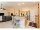 Bright kitchen features wooden cabinets, granite countertops, and stainless steel appliances at 10243 Cowboys Dream St, Las Vegas, NV 89131