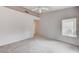 Large bedroom with a ceiling fan, lots of open space, and window with blinds at 10636 Argents Hill Dr, Las Vegas, NV 89134