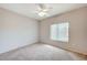 Bedroom featuring a ceiling fan, neutral walls and carpet flooring at 10636 Argents Hill Dr, Las Vegas, NV 89134