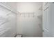 Walk-in closet with white wire shelving and white walls at 10636 Argents Hill Dr, Las Vegas, NV 89134