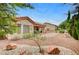 Home featuring desert landscaping and a covered patio at 10636 Argents Hill Dr, Las Vegas, NV 89134