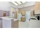 Charming kitchen with white countertops, ample storage space, and modern appliances at 10636 Argents Hill Dr, Las Vegas, NV 89134