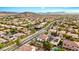 A Primary-planned community featuring well-maintained homes, tree-lined streets, and mountain views at 10668 Porta Romana Ct, Las Vegas, NV 89141