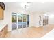 Bright living area opens to a backyard featuring a sparkling pool at 10668 Porta Romana Ct, Las Vegas, NV 89141