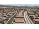 Aerial view of a neighborhood with sidewalks, desert landscaping, and scenic views at 1081 Via Gandalfi, Henderson, NV 89011