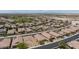 Aerial view of a neighborhood showcasing homes with desert landscaping, and scenic views at 1081 Via Gandalfi, Henderson, NV 89011