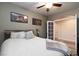 Bedroom with a ceiling fan, bed, and a doorway to another room at 1081 Via Gandalfi, Henderson, NV 89011