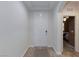 Bright entryway features wood floors, neutral paint, and a white front door at 1081 Via Gandalfi, Henderson, NV 89011
