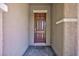 Front entryway with a decorative front door and brick walkway creating a welcoming entrance to the home at 1081 Via Gandalfi, Henderson, NV 89011