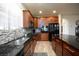 Well-equipped kitchen featuring granite countertops, stainless appliances, and ample cabinet space at 1081 Via Gandalfi, Henderson, NV 89011