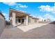 Spacious backyard featuring a covered patio area perfect for outdoor living at 11049 Concord Valley Drive, Las Vegas, NV 89135